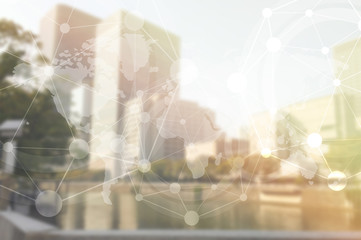 Double exposure of Blurred building and world map for business and financial background product.