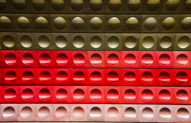 Colorful Modern with round hole pattern wall at Prague Metro Station for background