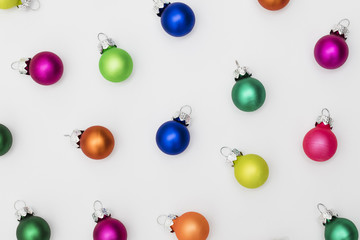 Festive Christmas baubles on a plain white background