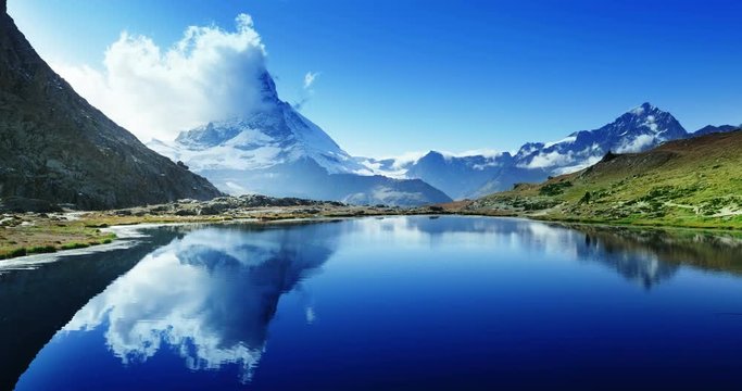 Reflection of Matterhorn in lake Riffelsee, Zermatt, Switzerland