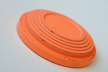 orange clay pigeon
