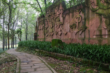 An empty path through the park in the summer day