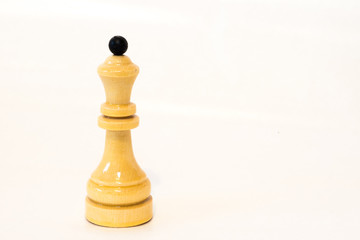 The isolated whit chess queen on the white background