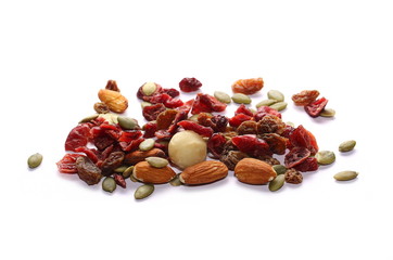 Mix of roasted and salted macadamia, almonds, pumpkin seeds and raisins isolated on white background

