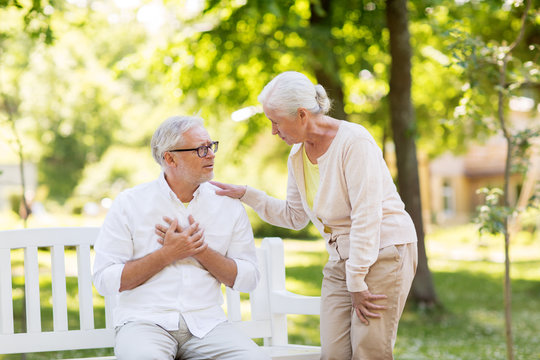 Senior Man Feeling Sick At Summer Park