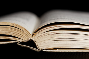 open old book on black background