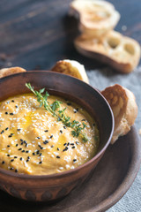 Bowl of pumpkin hummus