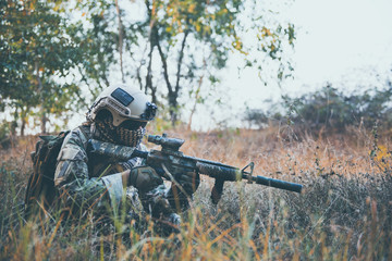 Soldiers are preparing to hit the enemy in the forest,military in war concept