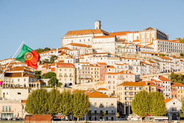 Fototapeta na wymiar Cityscape view on the hill of the old town of Coimbra city in the central Portugal