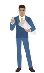 Businessman with mobile phone holding the project plans
