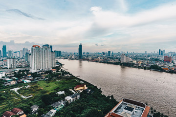 Fototapeta na wymiar Bangkok cityscape skyline panorama as seen from above aerial view photography in Bangkok, Thailand
