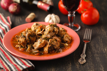 Chicken curry on dark background