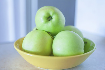 green apples in plate