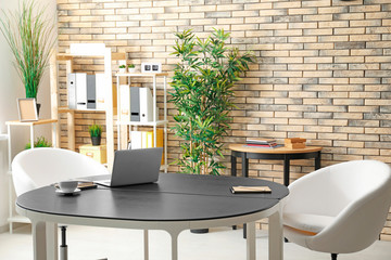 Comfortable workplace in light room