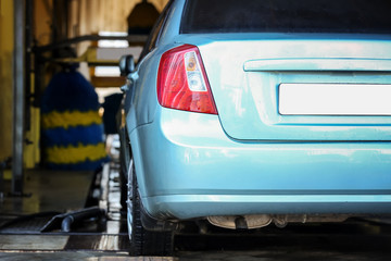 Fototapeta premium Automobile at automatic car wash