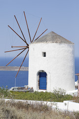 Windmill located in Oia town on Santorini island, Greece