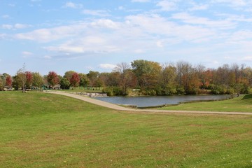 A day in the park at the the lake in the autumn season.