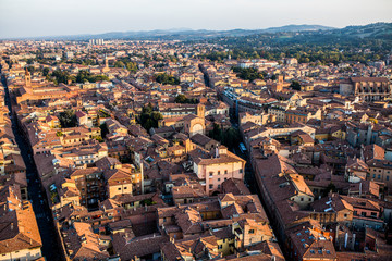 Aerial view of Bologna, Italy at sunset. Colorful sky over the historical city center and old buildings