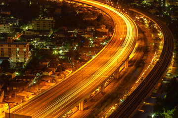 Fototapeta na wymiar Transportation in modern city, Street night light, light trails at night on motorway, urban view at night time