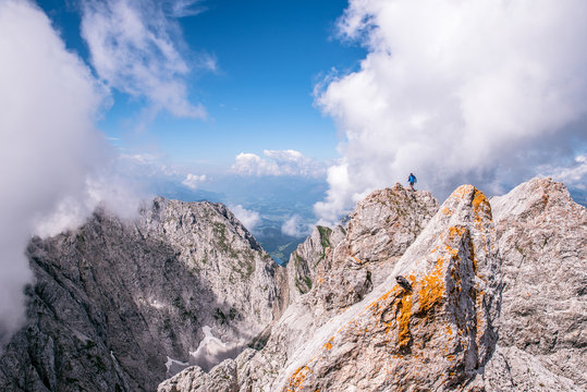 Hiker at Ellmauer Halt, Wilder Kaiser mountains of Austria - close to Gruttenhuette, Going, Tyrol, Austria - Hiking in the Alps of Europe