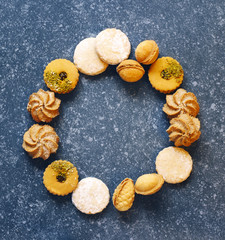 Assorted cookies: linzer cookies,shortbread, nuts cookie, orange almond cookie. Cookies wreath.