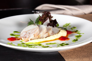 fish dish with mashed potatoes