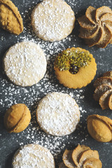 Fototapeta na wymiar Assorted cookies: linzer cookies,shortbread, nuts cookie, orange almond cookie.
