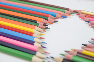 
many multicolored pencils on white background
