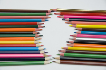 
many multicolored pencils on white background