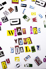 A word writing text showing concept of What Are Your Goals question made of different magazine newspaper letter for Business case on the white background with copy space