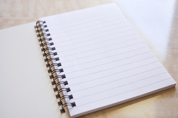 notebook on wooden table