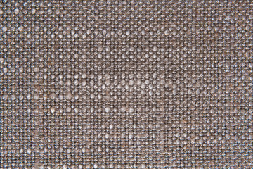 Texture of natural linen fabric in pattern gray color close-up in vintage style