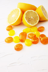 Mixed colorful fruit candies. bonbon in yellow and orange.