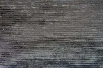 Texture of natural linen fabric in pattern gray color close-up in vintage style