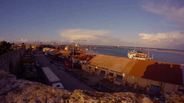 sea port and ships from the height of the tower of the medieval fortress