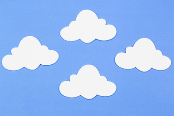 blue sky with clouds, frame, copyspace. Hand made felt toys. Abstract sky. Concept for travel agency, motivation, business development