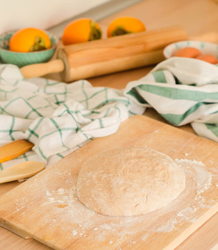 Fresch dough on a board with floar