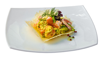 Risotto with shrimps and asparagus isolated on white