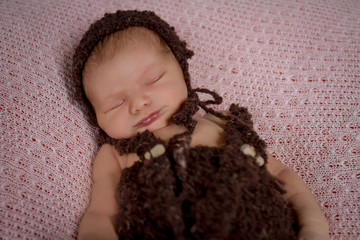 indoor portrait of newborn baby wrapped, newborn photography