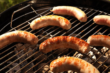 Sausages on barbecue grill