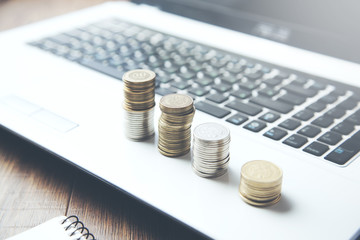 coins on computer keyboard