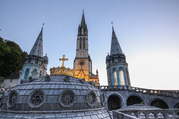 Obraz premium The gilded crown of the Lourdes Basilica