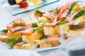 catering, snacks a sandwich with fish