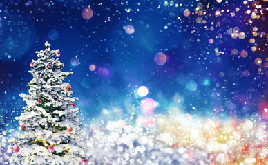 Christmas tree on a blue sparkly night sky