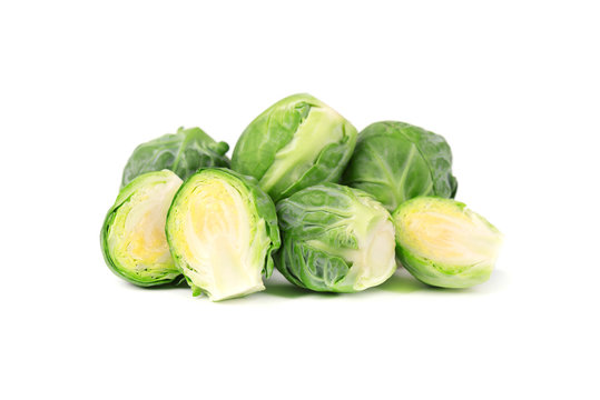 Brussels sprouts isolated on a white background. Pile of Brussels sprouts