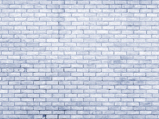 pale blue old brick wall with repeating pattern