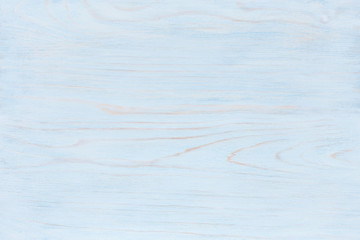 Texture of light blue wooden surface. Close up, top view, horizontal stripes.