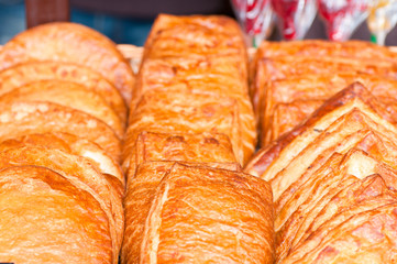 Confectionery buns in a basket, street trade, showcase cafe