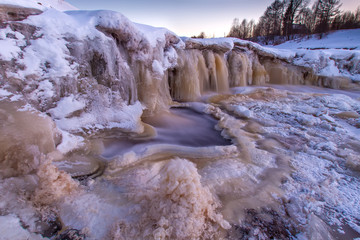 A frozen waterfall. Waterfall in winter. Winter.