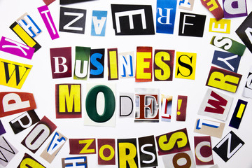 A word writing text showing concept of Business Model made of different magazine newspaper letter for Business case on the white background with copy space